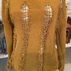 Mustard colored chenille stretch sweater peephole